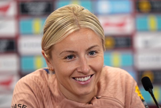 England captain Leah Williamson smiles as she speaks to the media