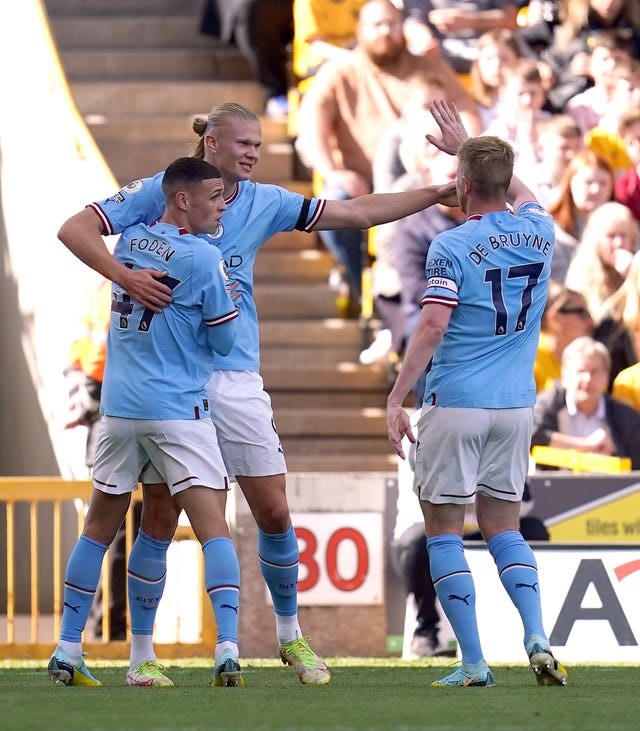 Haaland (centre) has scored 14 goals in 10 appearances for City
