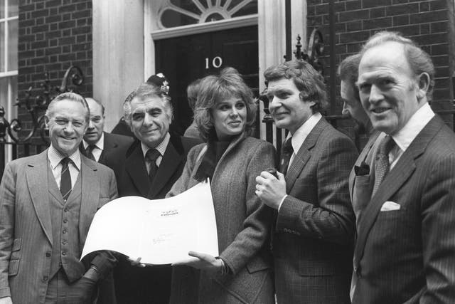 (l-r) Richard Todd, Sir Geraint Evans, Joanna Lumley, Derren Nesbett, Roy Dotrice and Gordon Jackson outside 10 Downing Street, where they handed in a letter expressing their sadness at the closure of the D'Oyly Carte Opera Company. The company has been performing the works of Gilbert and Sullivan for 106 years.