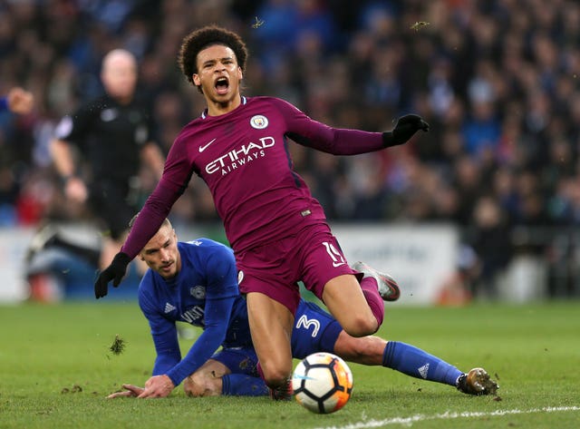 Leroy Sane was crunched by Cardiff’s Joe Bennett, who only received a yellow card