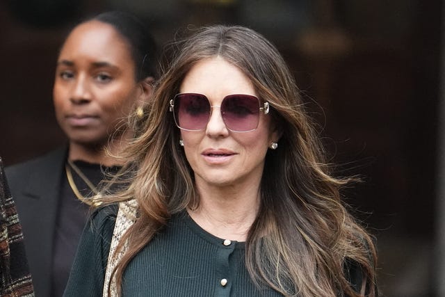 Liz Hurley (right) leaving the Royal Courts of Justice last month