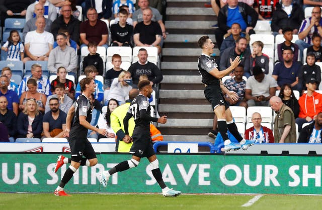 Tom Lawrence, right, celebrates his second goal of the game