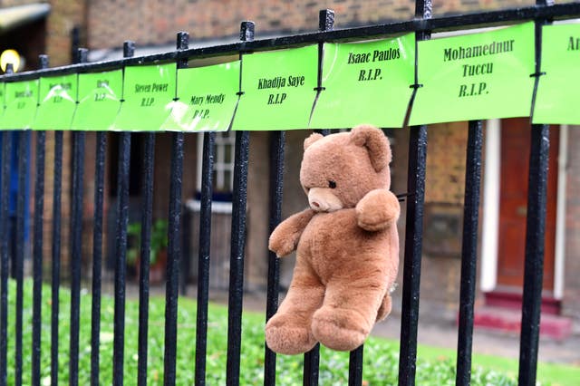 Tributes tied to railings near Latimer Road, west London, in memory of the 72 people who lost their lives in the Grenfell Tower fire