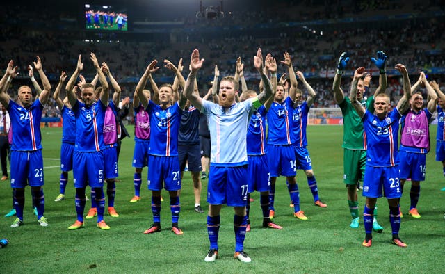 Iceland’s Aron Gunnarsson (centre) leads the Iceland celebrations on the pitch after Euro 2016 victory over England