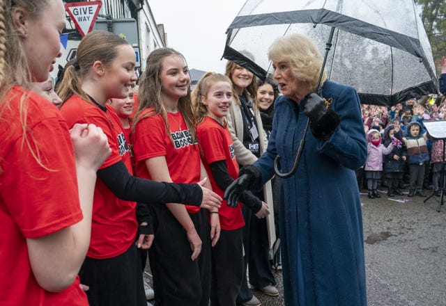 The Queen meets wellwishers at The Sun Inn in Dedham