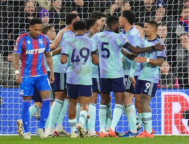 Arsenal players celebrate Kai Havertz's goal with a group hug