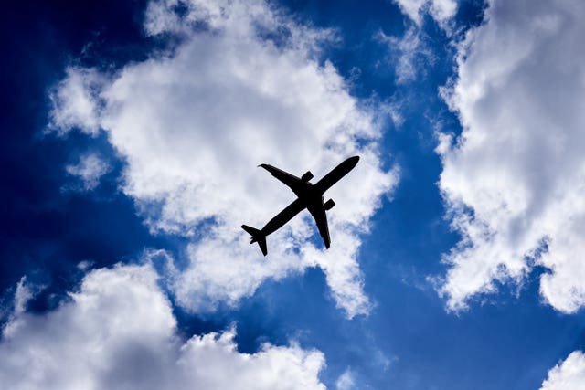 A silhouette of a plane