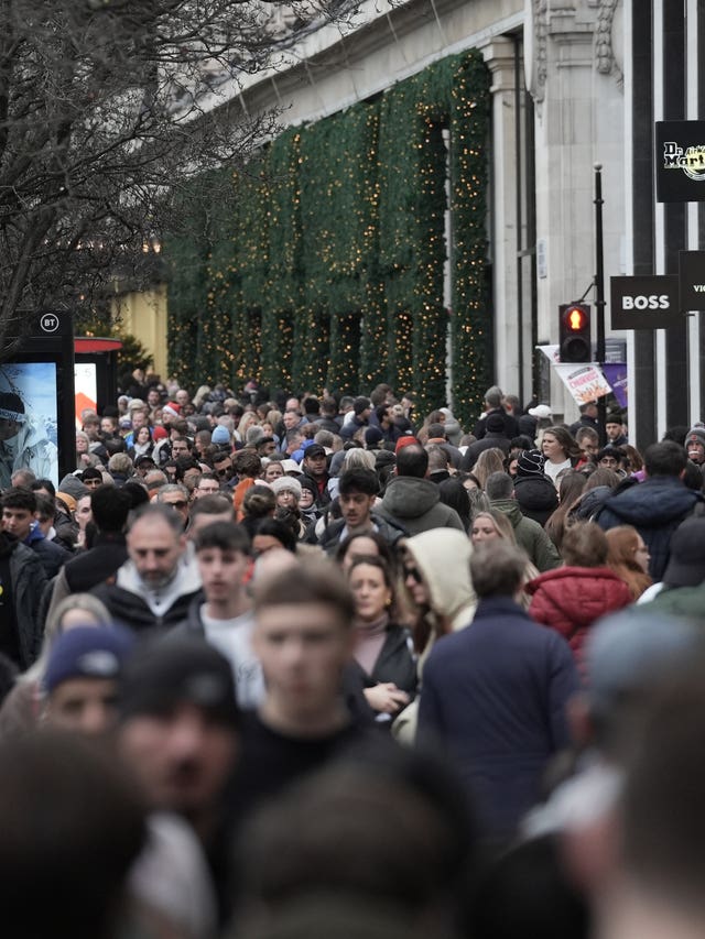 Shoppers on Oxford Street, in London ahead of Christmas Day on Wednesday. 