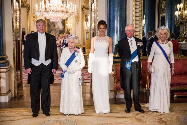 US President Donald Trump, Queen Elizabeth II, Melania Trump, the then-Prince of Wales and the Duchess of Cornwall at the 2019 State Banquet at Buckingham Palace 