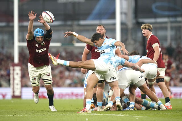 British and Irish Lions’ Tadhg Beirne (left) attempts to block the clearance 