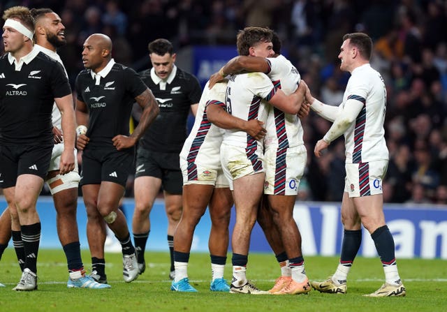 England’s Immanuel Feyi-Waboso celebrates scoring England's first try 