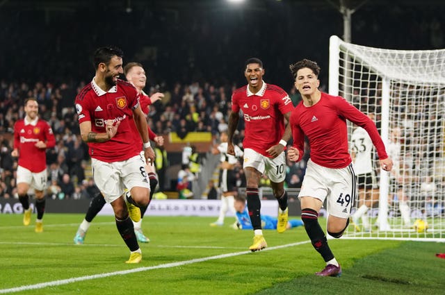 Manchester United teenager Alejandro Garnacho, right, stepped off the bench to score in stoppage time and clinch his side a 2-1 win at Fulham