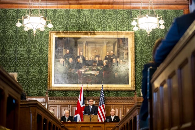 US House Speaker Mike Johnson addresses MPs in the House of Commons alongside Speaker of the House of Lords, Lord McFall (left) and Speaker of the House of Commons Sir Lindsay Hoyle (right)