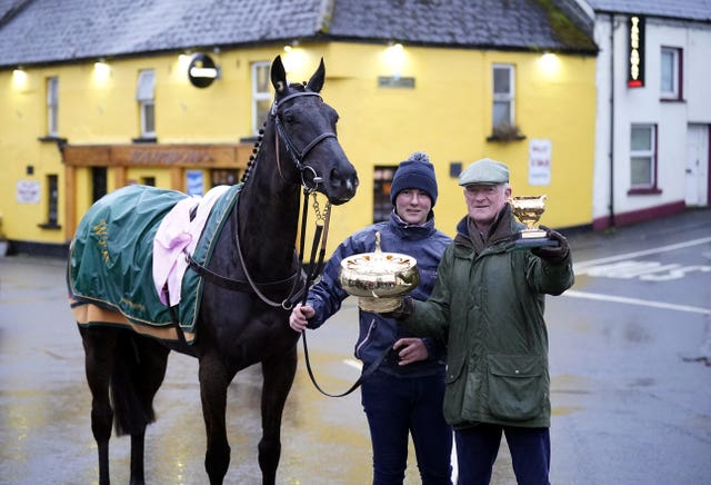 Galopin Des Champs along with trainer Willie Mullins during the homecoming parade through the village of Leighlinbridge in County Carlow 