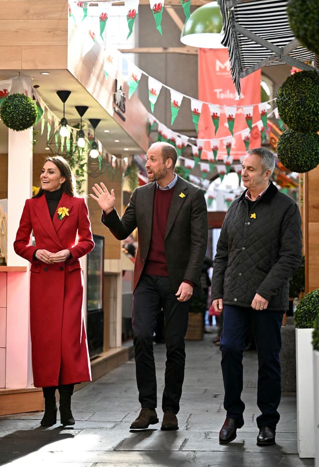 The Prince and Princess of Wales during a visit to Pontypridd Market in Wales to talk to local business owners about the impact of the flooding caused by Storm Bert and Storm Darragh, and help prepare and cook a batch of Welsh cakes at the The Welsh Cake Shop