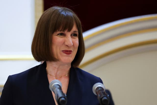 Rachel Reeves smiles as she gives a speech at Mansion House