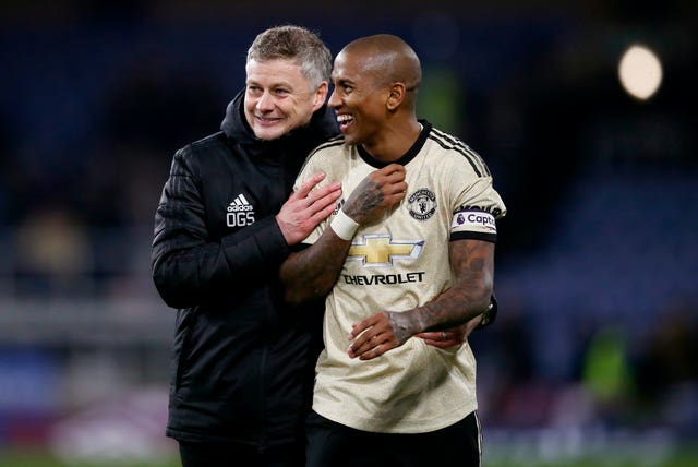 Ole Gunnar Solskjaer, left, wants to keep Ashley Young at Old Trafford 