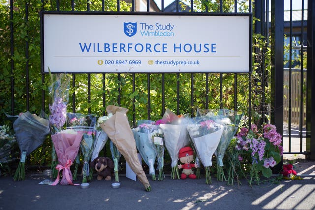 Car collides with primary school building