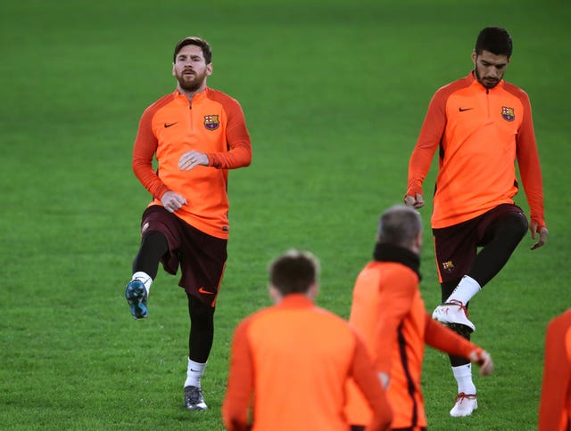 Barcelona’s Lionel Messi (left) and Luis Suarez train ahead of the match with Chelsea (John Walton/PA).
