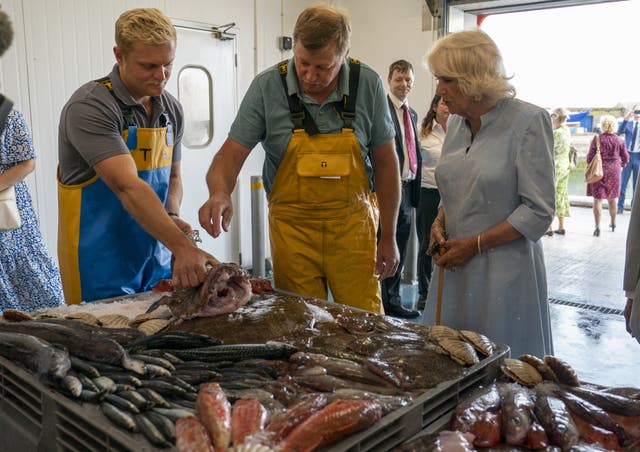 The Duchess of Cornwall talks to fishmongers