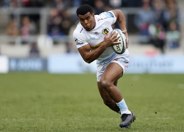 Immanuel Feyi-Waboso runs with the ball during Exeter's game against Sale