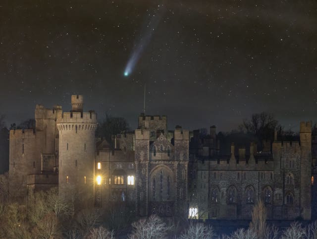 A comet falling over Arundel Castle turrets 