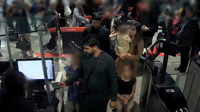 Sara Sharif’s father, stepmother and uncle going through passport control at Heathrow Airport in London