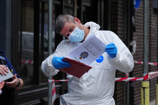 investigators enter a disused building in Fore Bondgate (Owen Humphreys/PA)