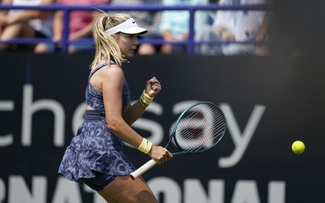Katie Boulter clenches her fist after winning a point against Jelena Ostapenko in Eastbourne