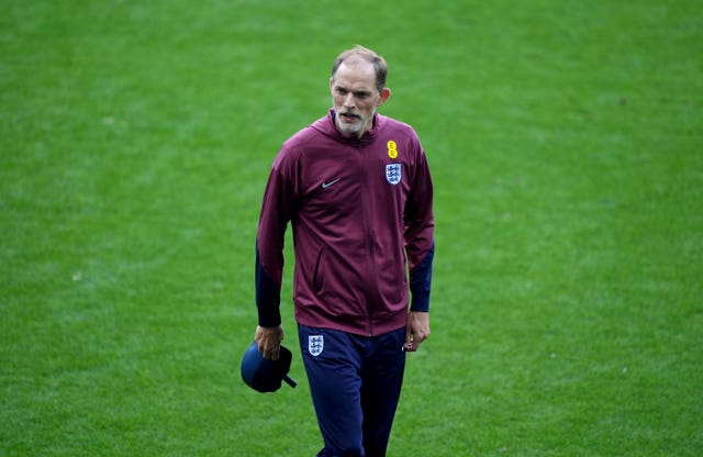 Thomas Tuchel walks on the pitch in Spain