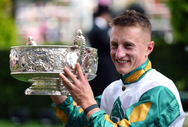 Tom Marquand with the Coronation Stakes trophy