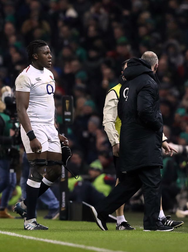 Maro Itoje, left, leaves the field injured against Ireland