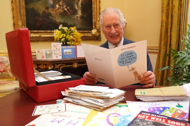 The King reads cards and messages, sent by wellwishers following his cancer diagnosis, in February 2024 