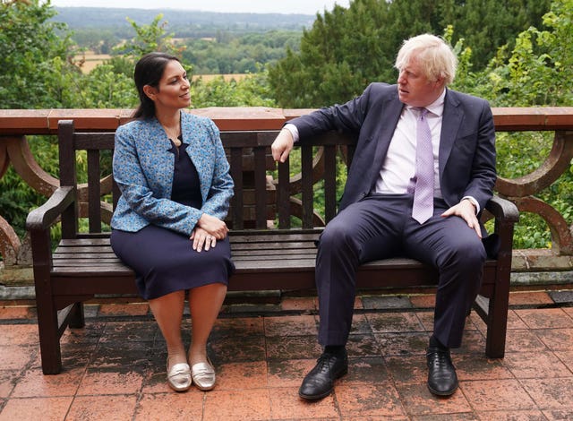 The Prime Minister, here with Home Secretary Priti Patel, is spending his first week out of isolation focusing on crime