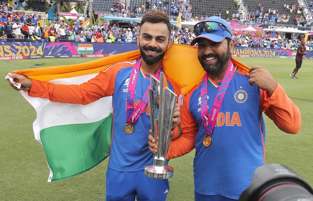 Virat Kohli, left, and Rohit Sharma celebrate India's World Cup victory