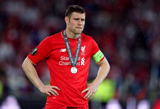 James Milner looks dejected following Liverpool's defeat