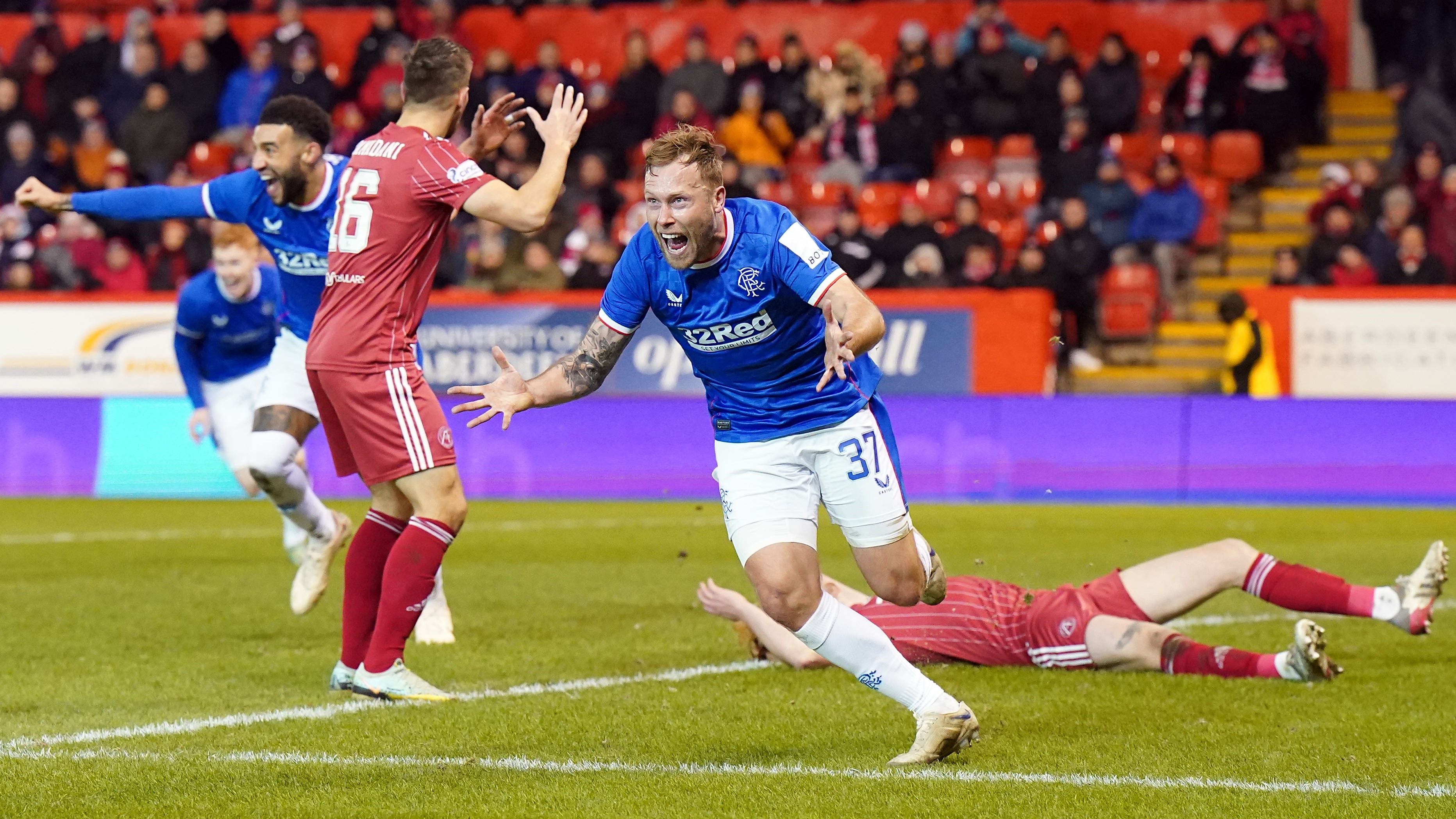 Scott Arfield celebrates his last-gasp winner (Jane Barlow/PA)