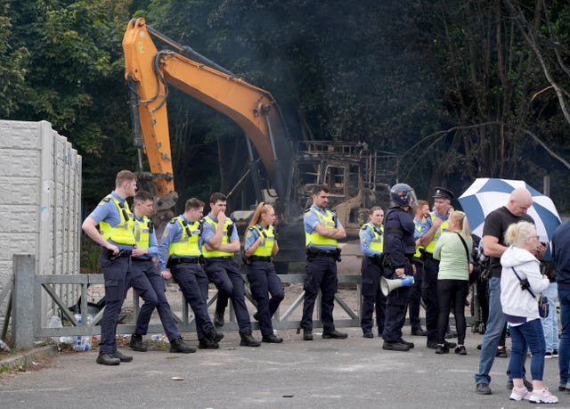 A group of people in high-vis jackets