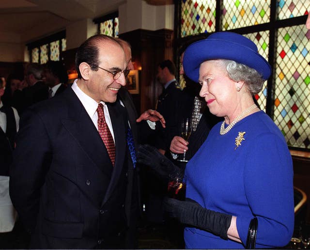 David Suchet with the Queen in 1999