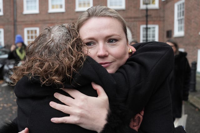 Barrister Charlotte Proudman is hugged as she arrives at 9 Grays Inn Square, London, ahead of a misconduct hearing, where she is accused of professional misconduct by the Bar Standards Board over comments she made of a “boy’s club” attitude within the judiciary