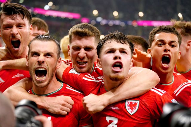 Gareth Bale (second left) celebrates with his Wales team-mates