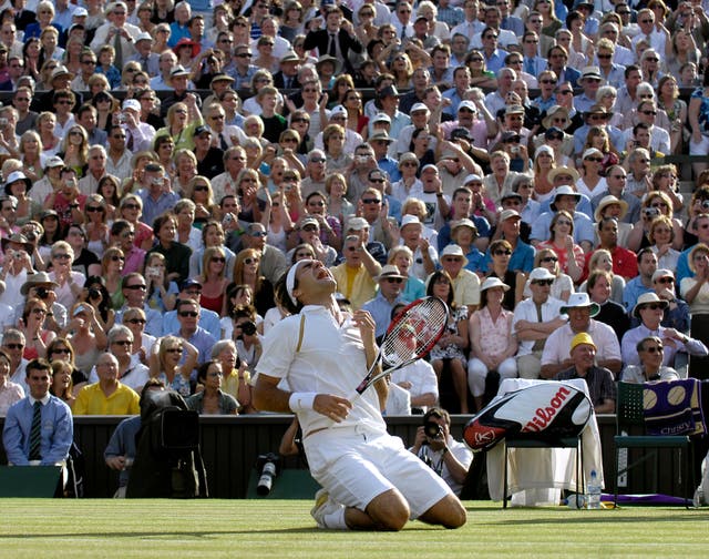 Federer sinks to his knees after beating Nadal in the 2007 final to take the title for a fifth time