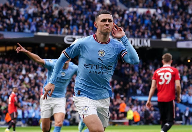 Phil Foden celebrates scoring against Manchester United