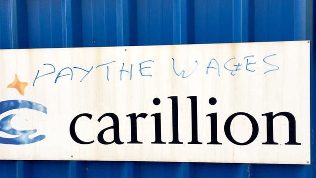 Graffiti at the site of the new £355m Royal Liverpool Hospital, which was being built by Carillion, as their construction workers will continue to be paid, while bonus payments to directors and former executives have been stopped.