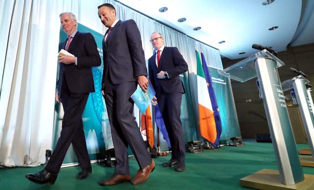 Michel Barnier, Taoiseach Leo Varadkar and Simon Coveney after a press conference at the Dundalk Institute of Technology (Niall Carson/PA)