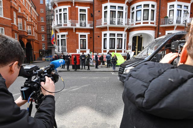 Media outside the Ecuadorian embassy on Thursday