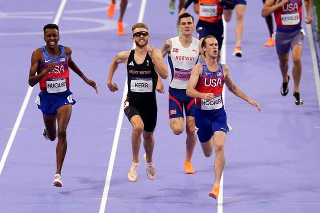 USA’s Cole Hocker, Great Britain’s Josh Kerr, USA’s Yared Nuguse and Norway’s Jakob Ingebrigtsen race to the line during the Men’s 1500m Final at the Stade de France on the eleventh day of the 2024 Paris Olympic Games in France. 