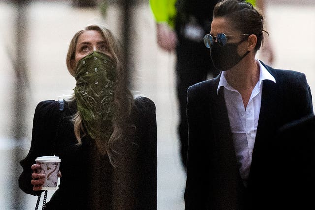Amber Heard, left, arriving at the High Court