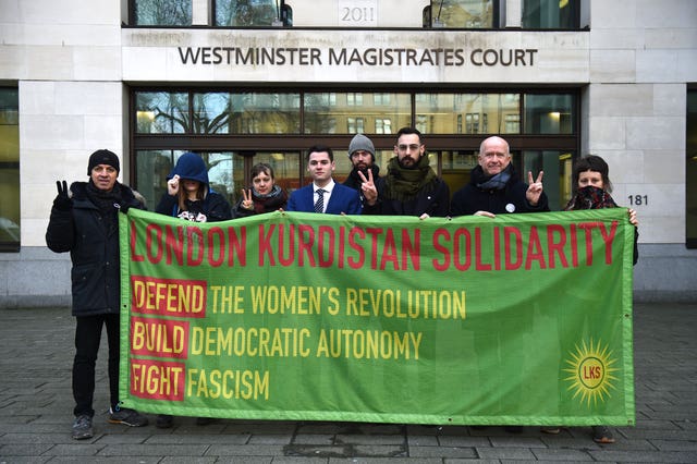 Samuel Newey and supporters outside court