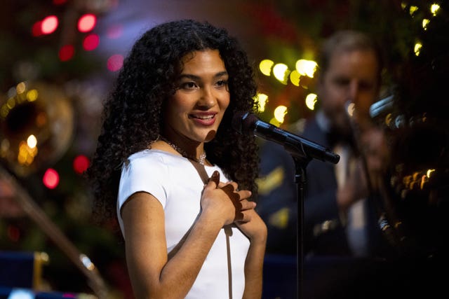 A musical performance by Olivia Dean in the nave during the Together At Christmas carol service at Westminster Abbey in London